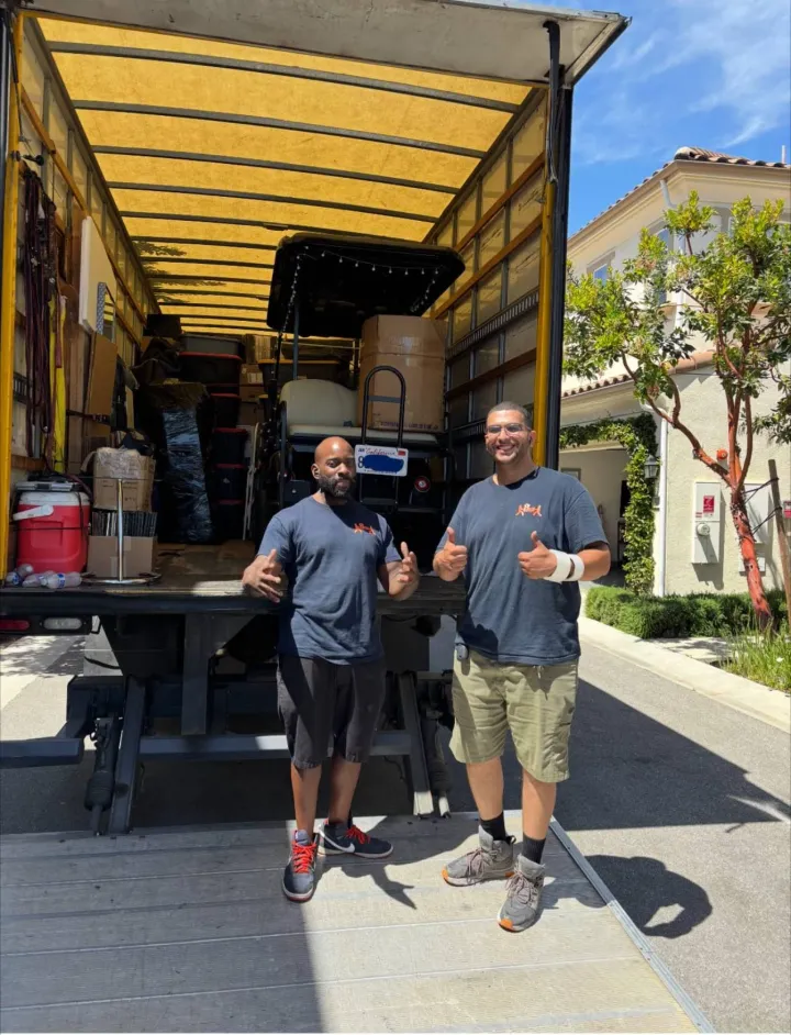 Helpful Moving crew together after completing a residential move in Orange County