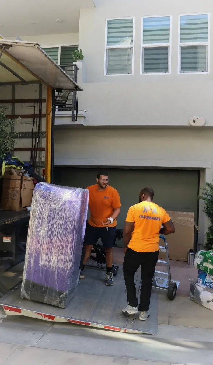 Owner Noah beside the Helpful Moving truck in Orange County